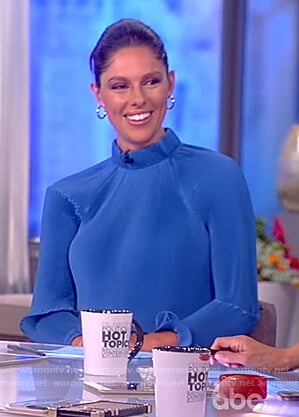 Abby's blue pleated mock neck top on The View