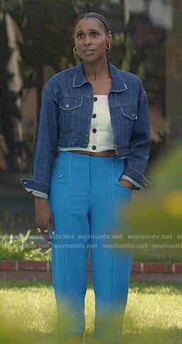 Issa's white button front top and denim jacket on Insecure