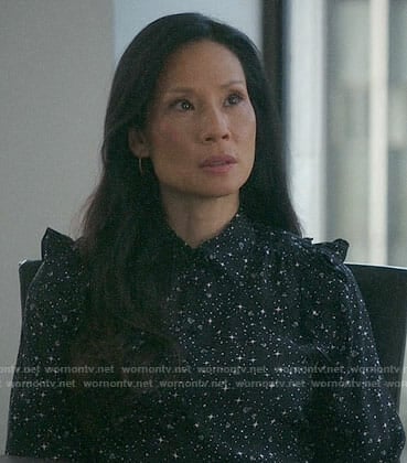 Joan's black star and diamond print blouse on Elementary