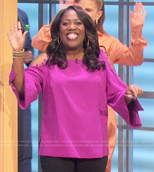 Sheryl’s purple button sleeve cold shoulder top on The Talk