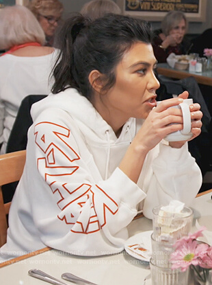 Kourtney’s white print sleeve hoodie on Keeping Up with the Kardashians