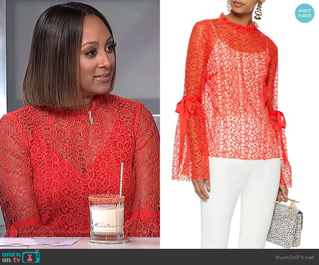 Just Lust bow-detailed lace blouse by Alice McCall worn by Tamera Mowry on The Real