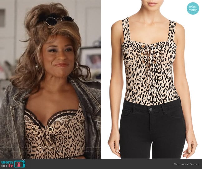 Franchesca Lace-Up Leopard Print Bodysuit by Guess worn by Poppy (Kimrie Lewis) on Single Parents