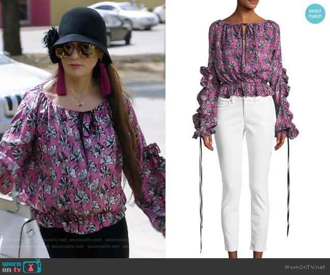 Orchid-Print Ruffle Long-Sleeve Silk Blouse by Robert Rodriguez worn by D’Andra Simmons on The Real Housewives of Dallas