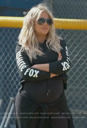 Khloe’s black White Fox logo sleeve sweater on Keeping Up with the Kardashians