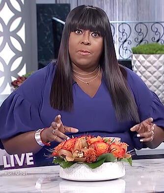 Loni’s blue puff sleeve dress on The Real