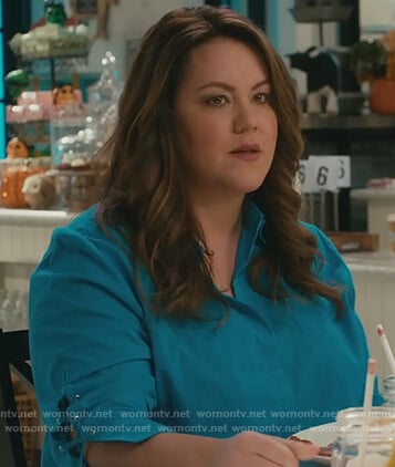 Katie’s turquoise lace-up sleeve blouse on American Housewife