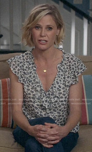 Claire’s printed ruffled top on Modern Family