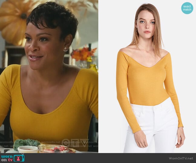 Eleven Modern Rib Off The Shoulder Tee by Express worn by Angela (Carly Hughes
) on American Housewife