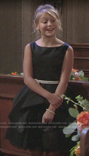 Faith’s black dress at Sharon’s wedding on The Young and the Restless