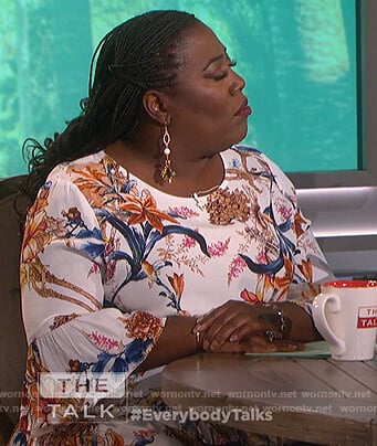 Sheryl’s white floral print bell sleeve top on The Talk