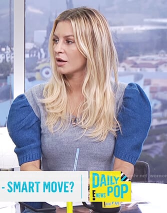 Morgan’s gray puff shoulder short sleeve sweater on E! News Daily Pop