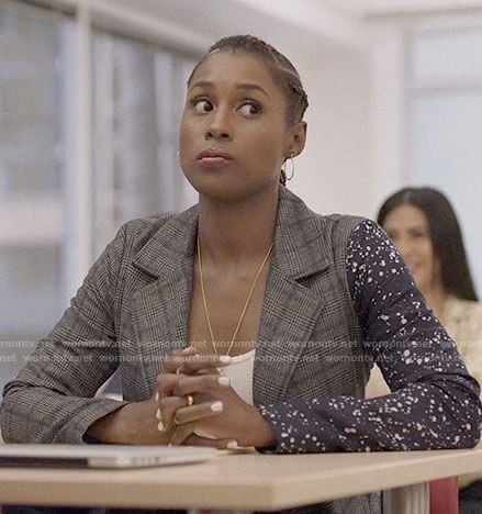 Issa's plaid and paint splatter blazer on Insecure