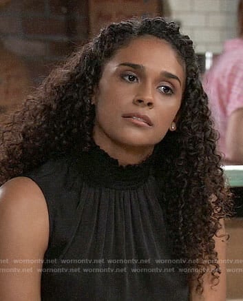 Jordan's black smocked neck top on General Hospital