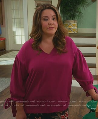 Katie's pink tie sleeve blouse on American Housewife