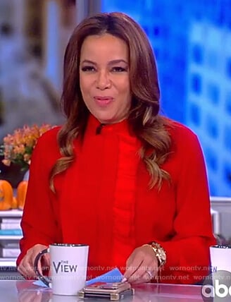 Sunny’s red ruffle front belted dress on The View
