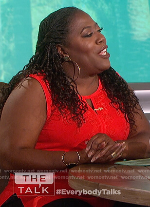 Sheryl’s red keyhole sleeveless top on The Talk