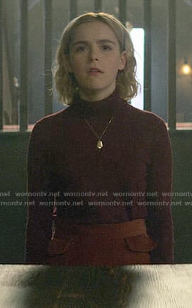 Sabrina’s burgundy turtleneck and brown skirt on Chilling Adventures of Sabrina