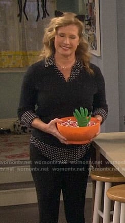 Vanessa’s black polka dot shirt and sweater on Last Man Standing