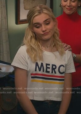 Taylor’s white Merci graphic tee on American Housewife