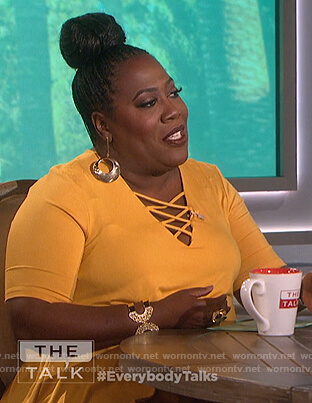 Sheryl's yellow strappy top on The Talk