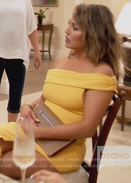 Kelly’s yellow off shoulder slit dress on The Real Housewives of Orange County