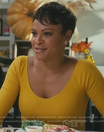 Angela’s yellow ribbed top on American Housewife