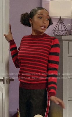 Zoey’s red striped sweater and LOVE pants on Black-ish