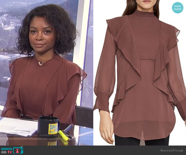 WornOnTV Zuri s brown ruffled blouse on E News Daily Pop Zuri