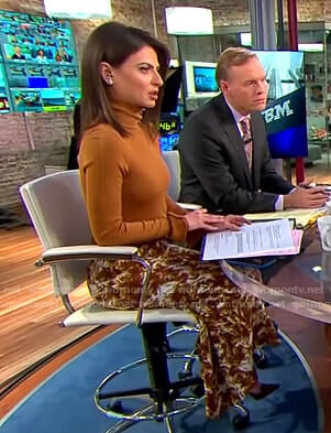 Bianna’s orange turtleneck sweater and printed skirt on CBS This Morning