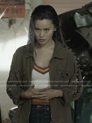 Clarice’s white varsity striped top and lace-up sleeve jacket on The Gifted