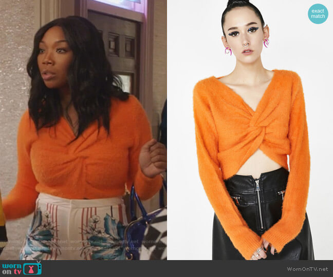 WornOnTV: Cassie’s orange twisted sweater and floral striped pants on ...