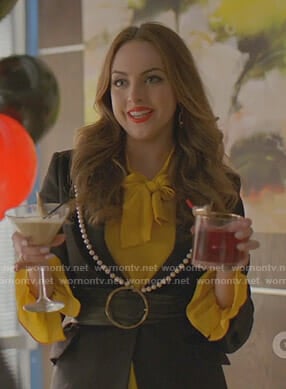 Fallon’s yellow blouse and black jacket with pearls on Dynasty