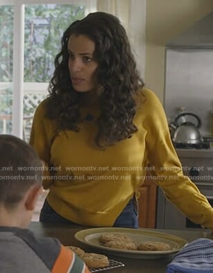 Grace’s yellow side slit sweater on Manifest