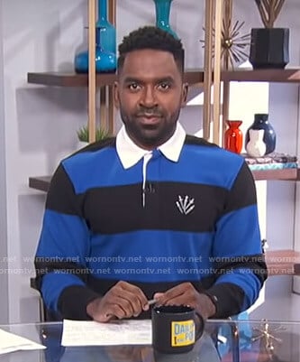 Justin’s blue and black striped rugby shirt on E! News Daily Pop