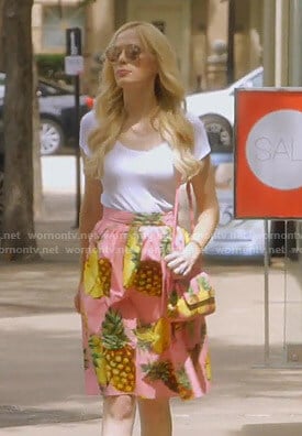 Kameron’s pink pineapple print skirt and bag on The Real Housewives of Dallas