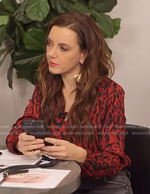 Melanie’s red leopard print wrap top on E! News