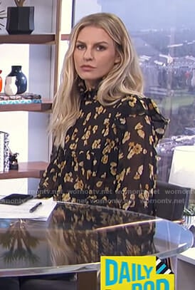 Morgan’s black smocked floral blouse on E! News Daily Pop