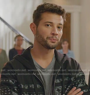 Sam's grey paint splatter tee and eyelet zipped hoodie on Dynasty