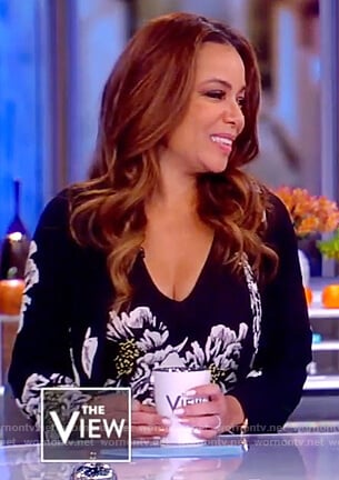 Sunny's black floral tie front blouse on The View
