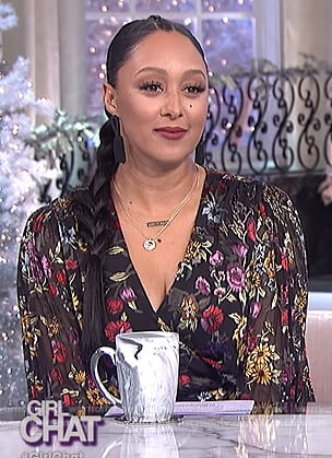 Tamera’s black floral wrap top on The Real