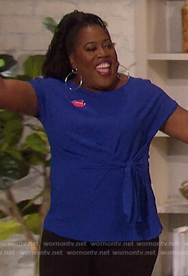 Sheryl's blue tie front top on The Talk
