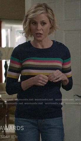 Claire’s rainbow striped sweater on Modern Family