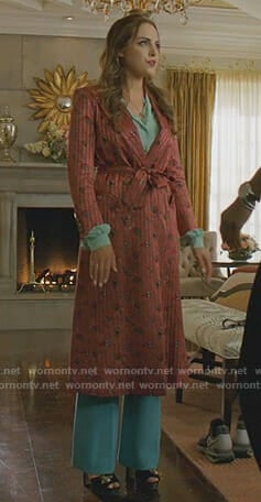 Fallon's red printed striped coat and flared pants on Dynasty