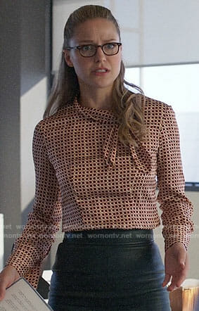 Kara's geometric print tie-neck blouse on Supergirl