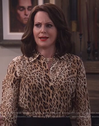 Karen's leopard print blouse and black side zip skirt on Will and Grace