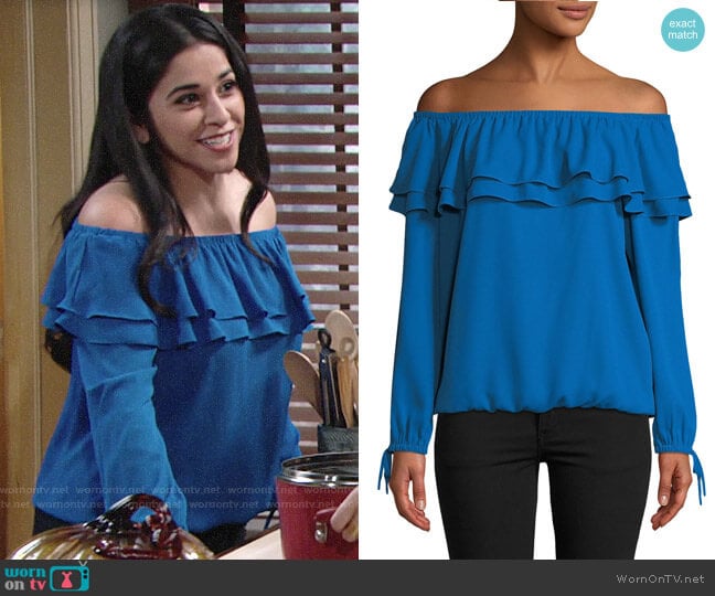 MICHAEL Michael Kors Ruffled Off-the-Shoulder Peasant Blouse worn by Mia Rosales (Noemi Gonzalez) on The Young and the Restless