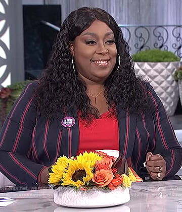 Loni's navy striped blazer on The Real