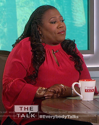 Sheryl’s red keyhole bell sleeve top on The Talk
