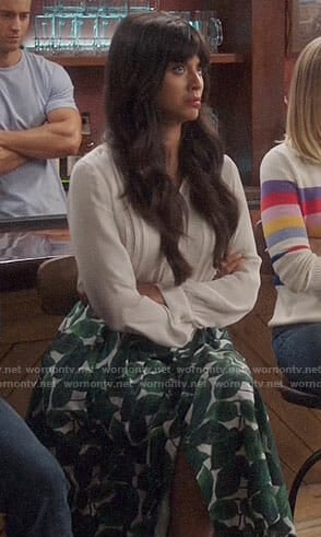 Tahani's leaf print skirt and white blouse on The Good Place